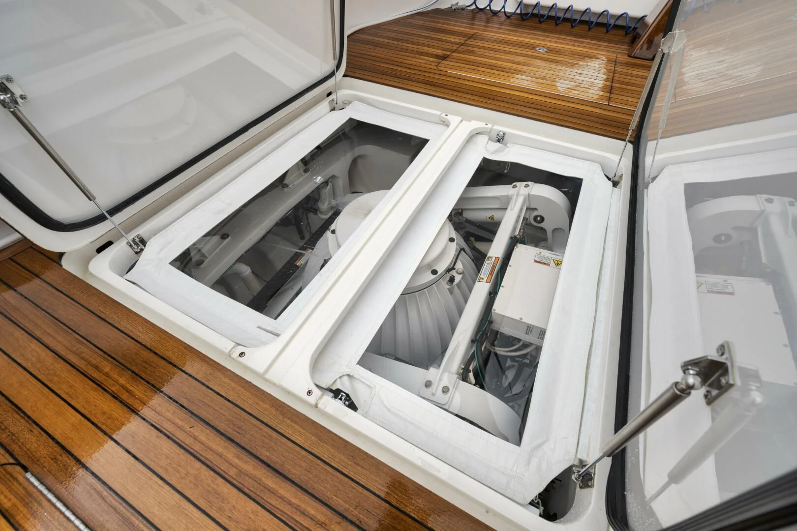 a car with a door open aboard TEUSEAS Yacht for Sale