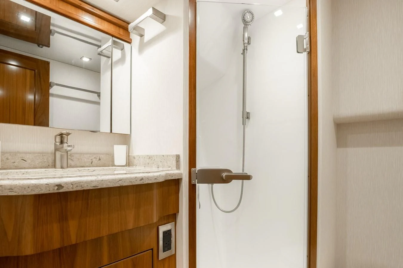 a bathroom with a shower and sink aboard TEUSEAS Yacht for Sale