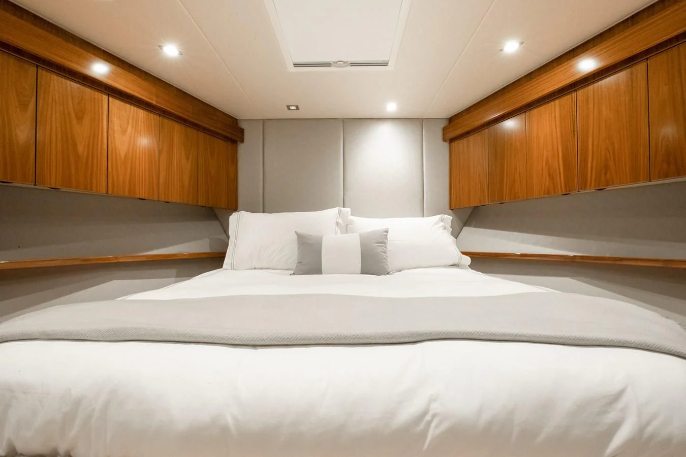a bed with white sheets aboard TEUSEAS Yacht for Sale