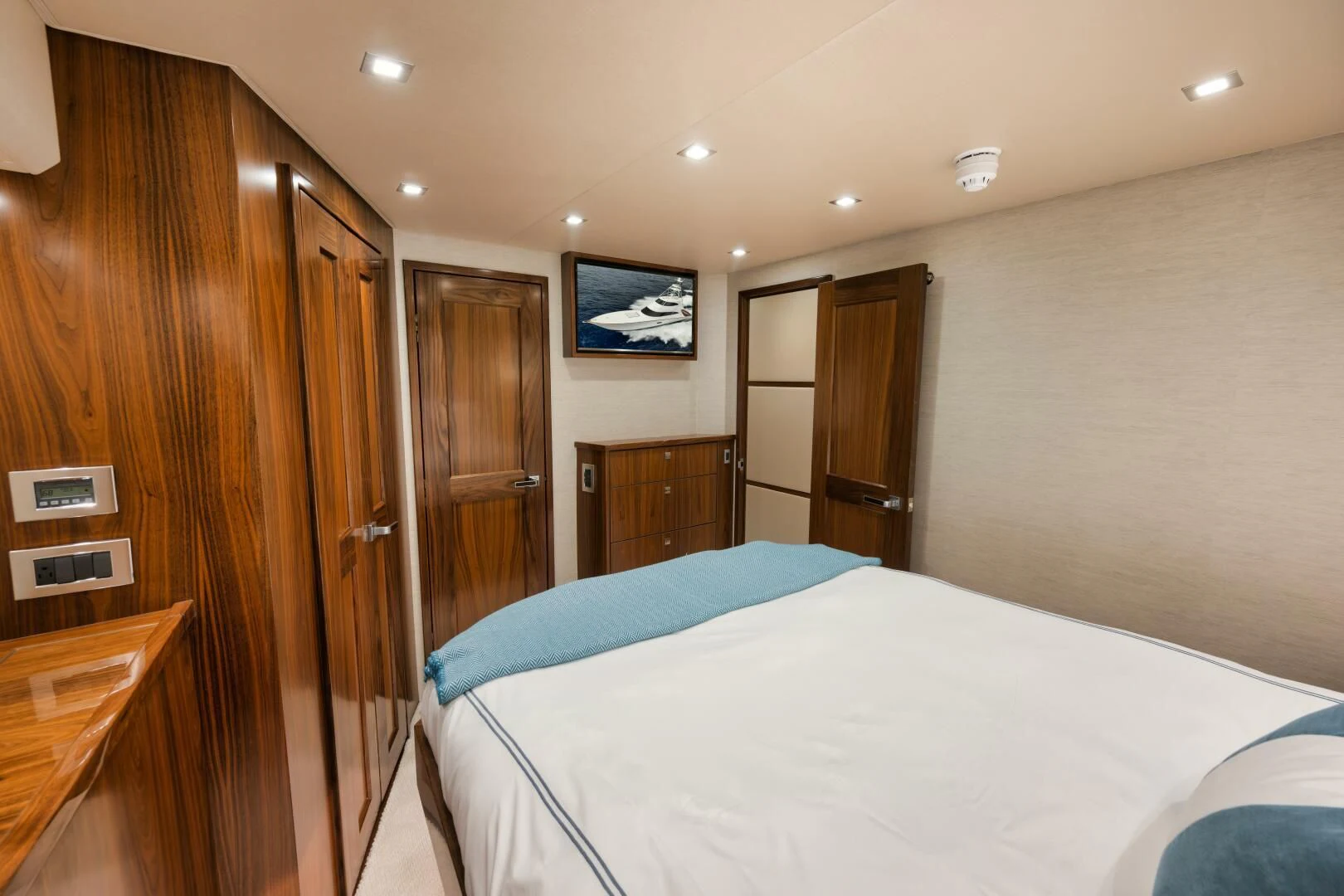 a hotel room with a bed aboard TEUSEAS Yacht for Sale