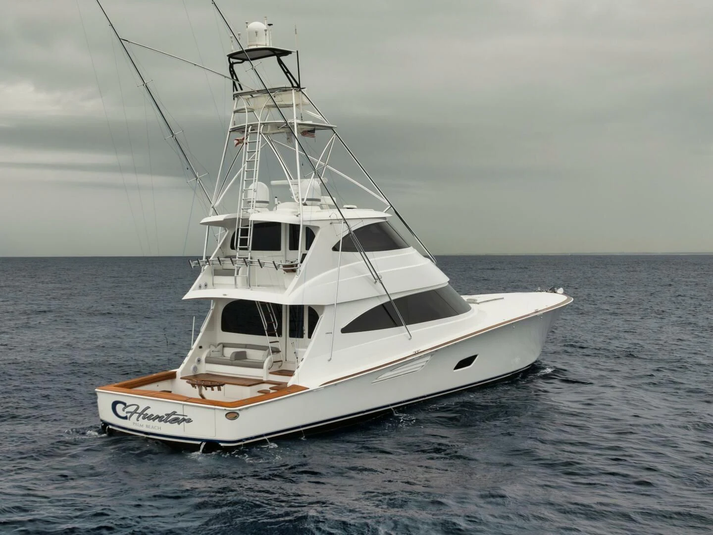 a white boat in the water aboard TEUSEAS Yacht for Sale