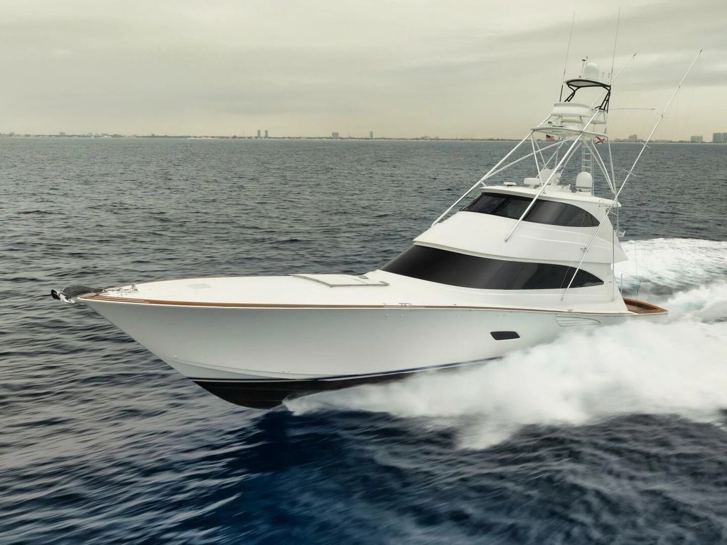 a white yacht on the water aboard TEUSEAS Yacht for Sale