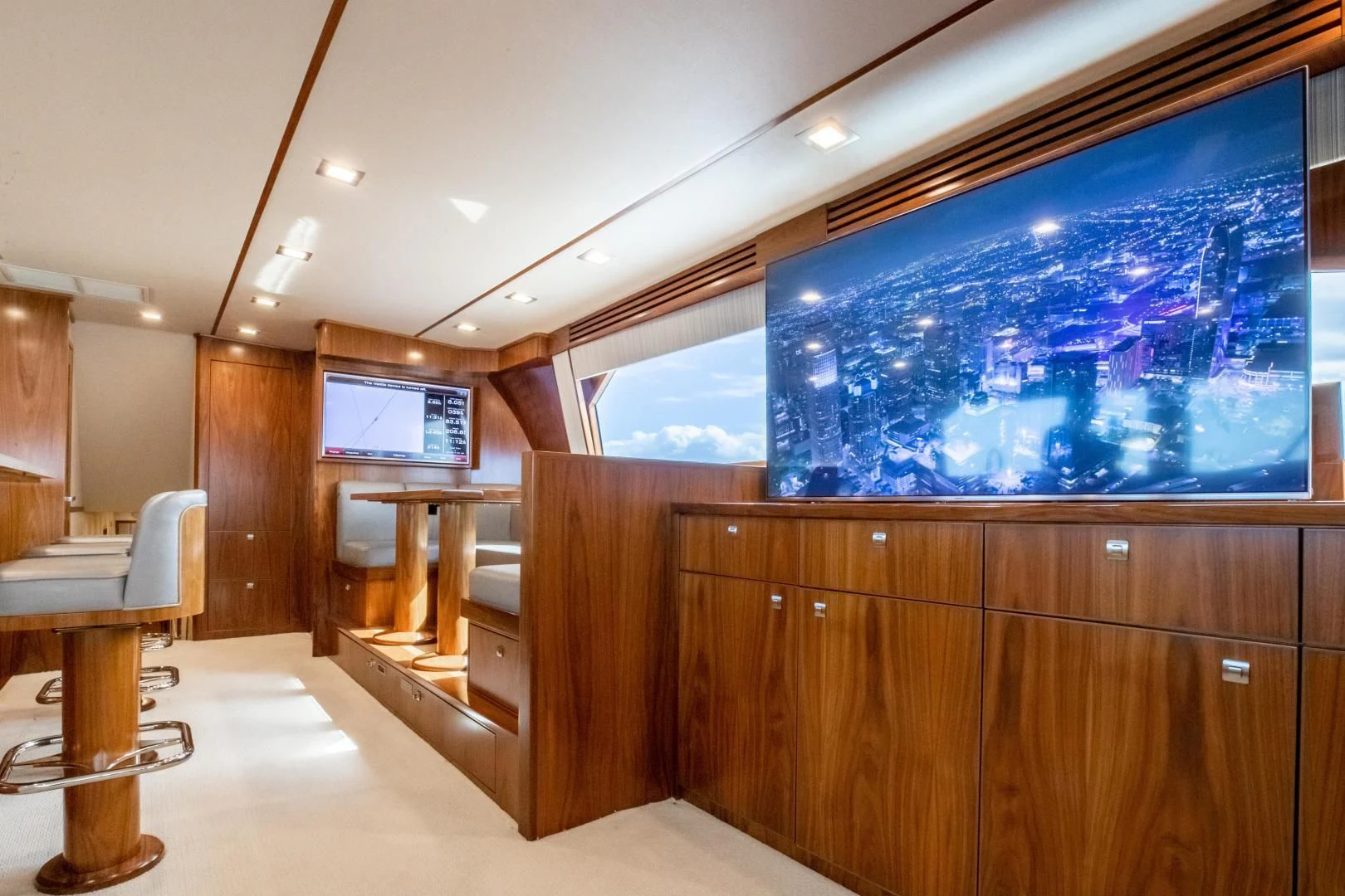 a room with a large screen aboard TEUSEAS Yacht for Sale