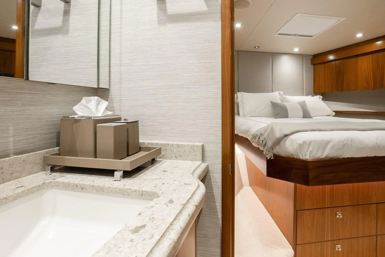 a bathroom with a bed and a sink aboard TEUSEAS Yacht for Sale