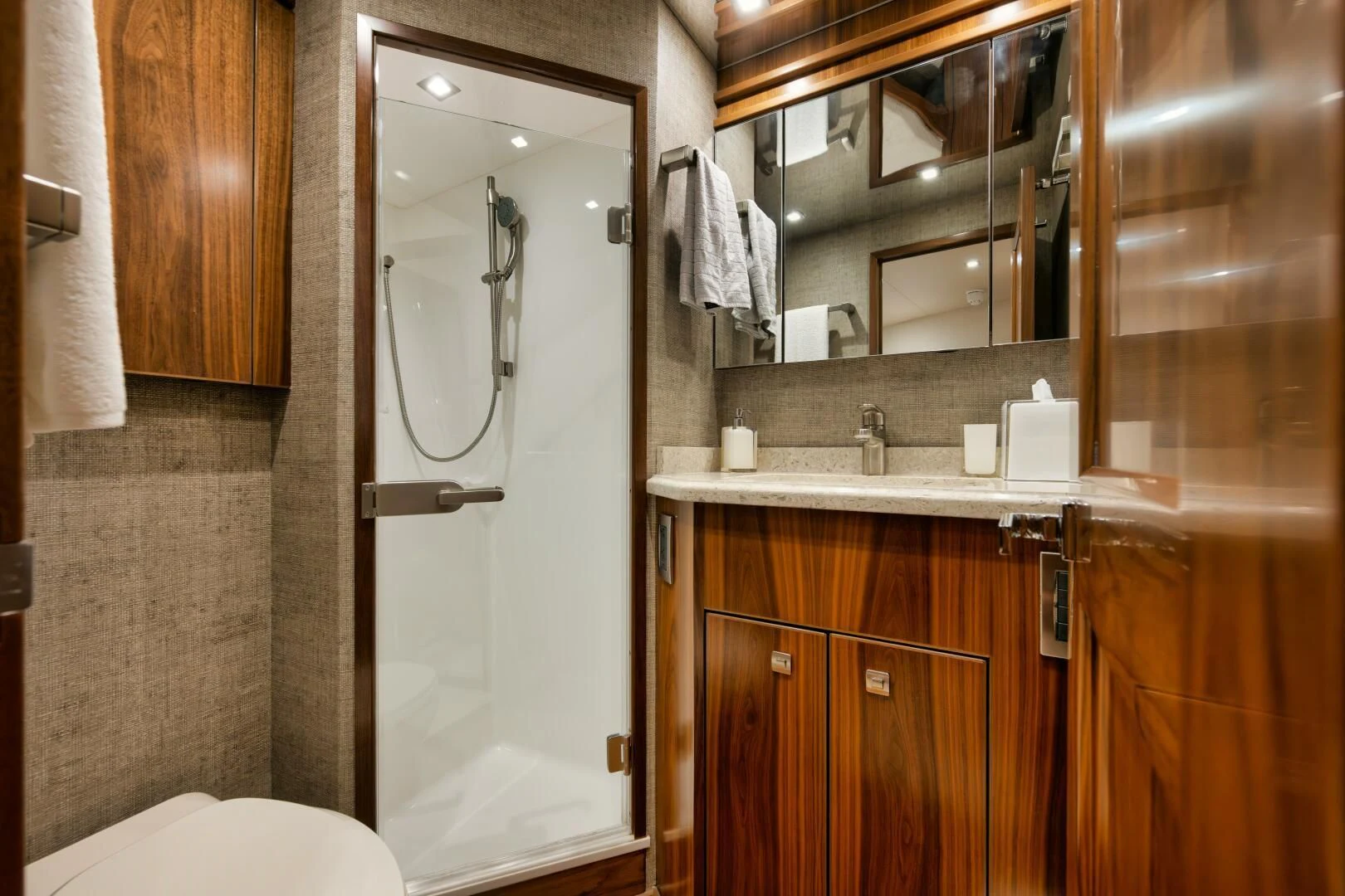 a bathroom with a sink and a mirror aboard TEUSEAS Yacht for Sale