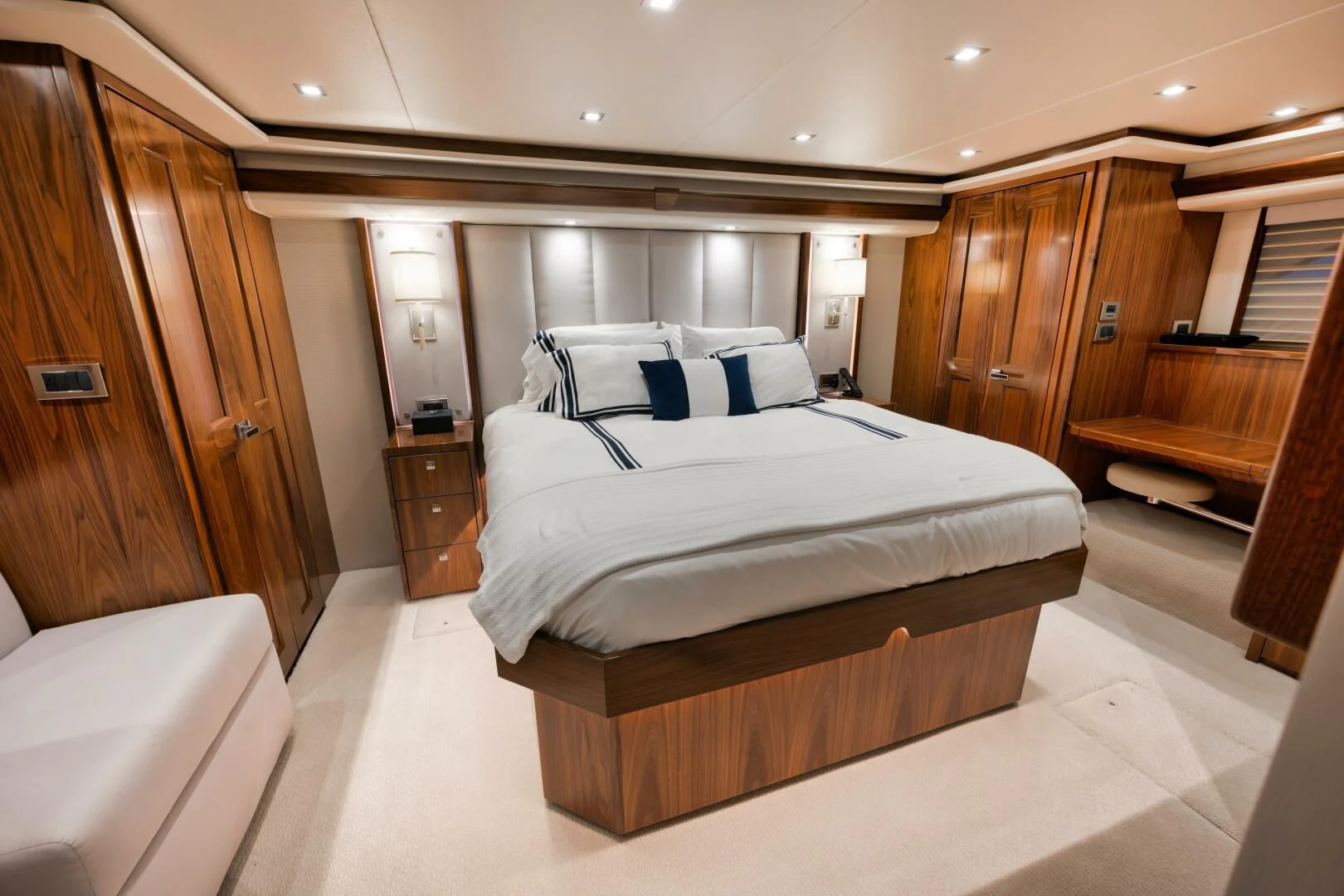 a large bedroom with a bed aboard TEUSEAS Yacht for Sale