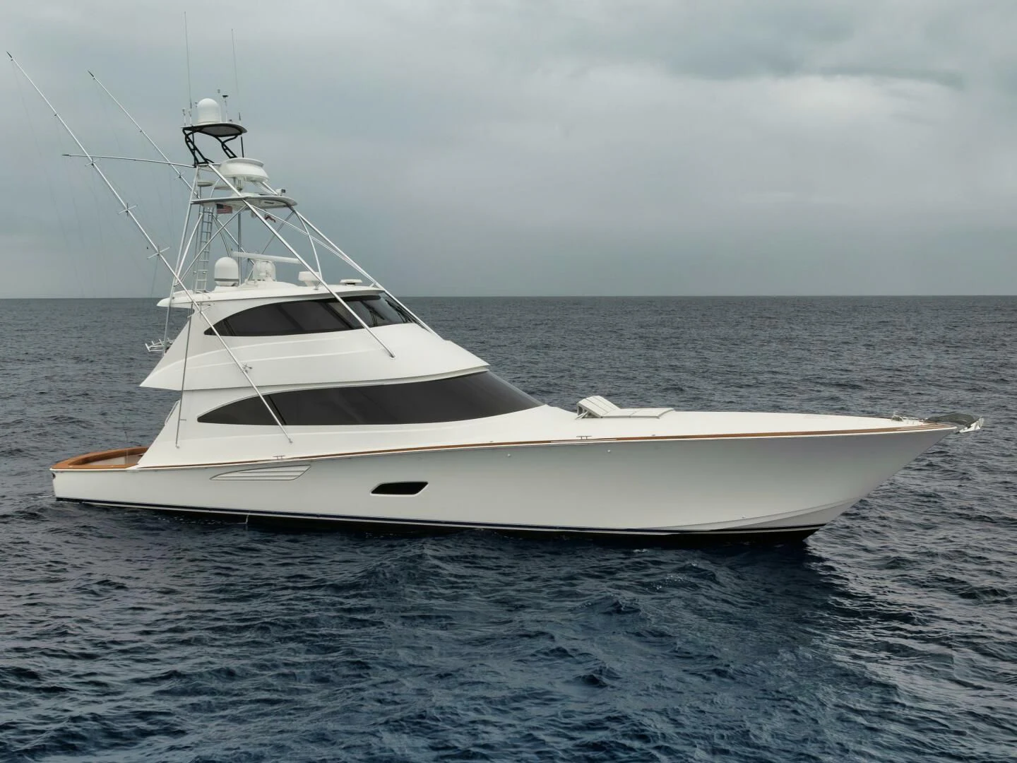 a white yacht in the water aboard TEUSEAS Yacht for Sale