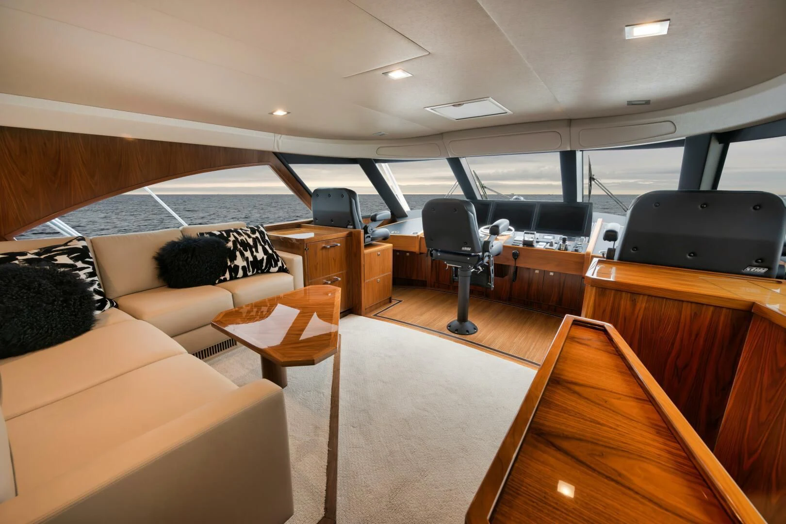 a room with a couch and a table aboard TEUSEAS Yacht for Sale