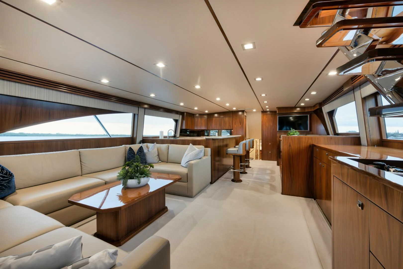 a living room with a couch and a table aboard TEUSEAS Yacht for Sale