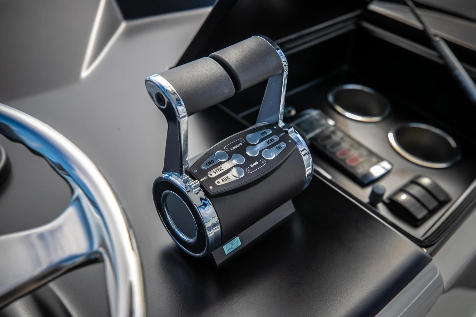 a car steering wheel and dashboard aboard TEUSEAS Yacht for Sale