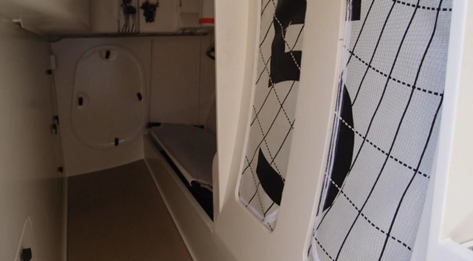 a toilet in a bathroom aboard HIGH SPIRIT Yacht for Sale