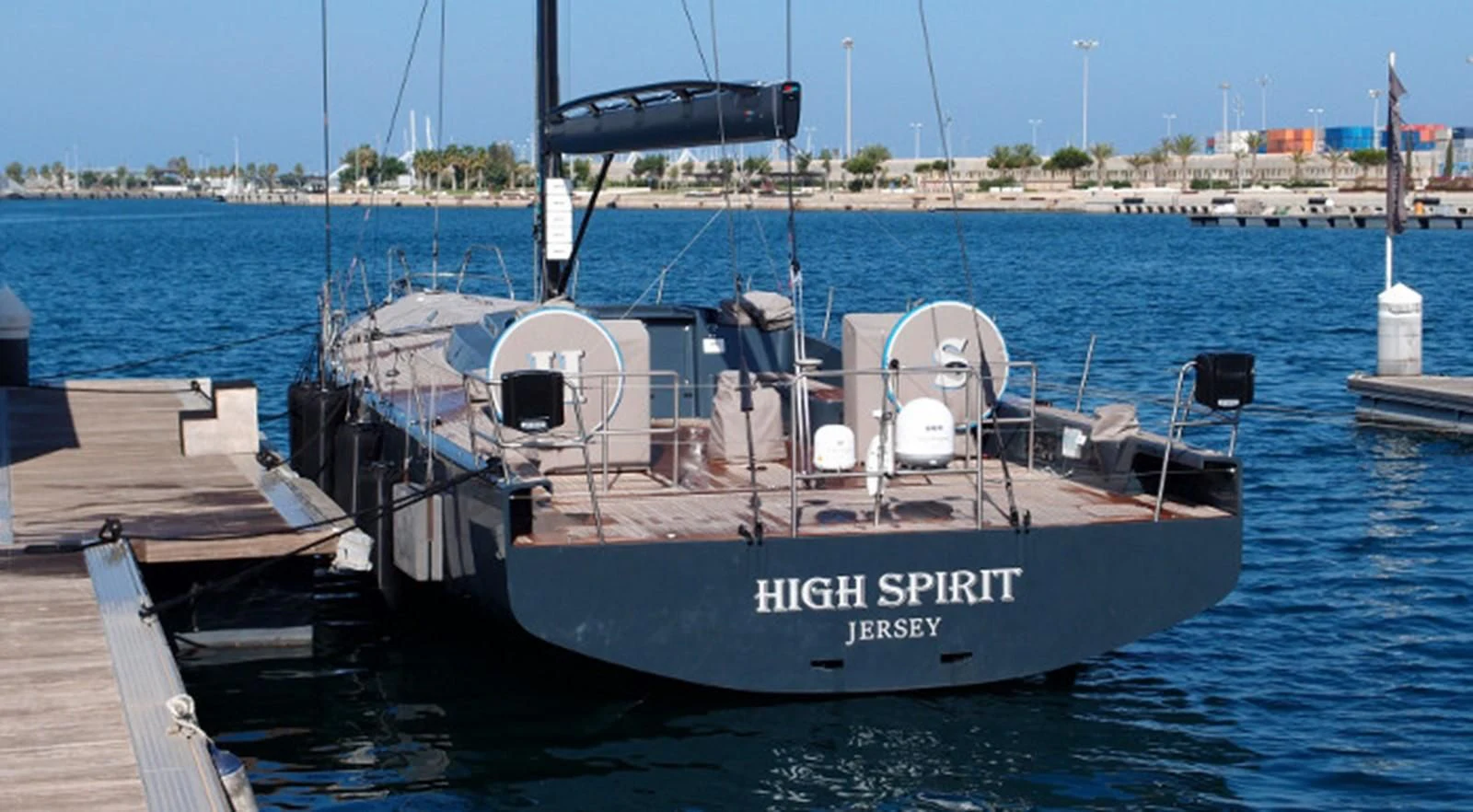 a boat docked at a pier aboard HIGH SPIRIT Yacht for Sale