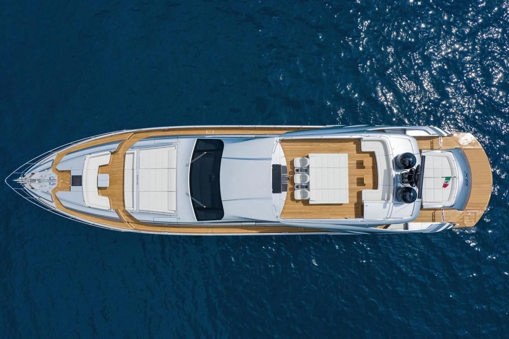 a yellow and white boat on water aboard OUR TRADE Yacht for Sale