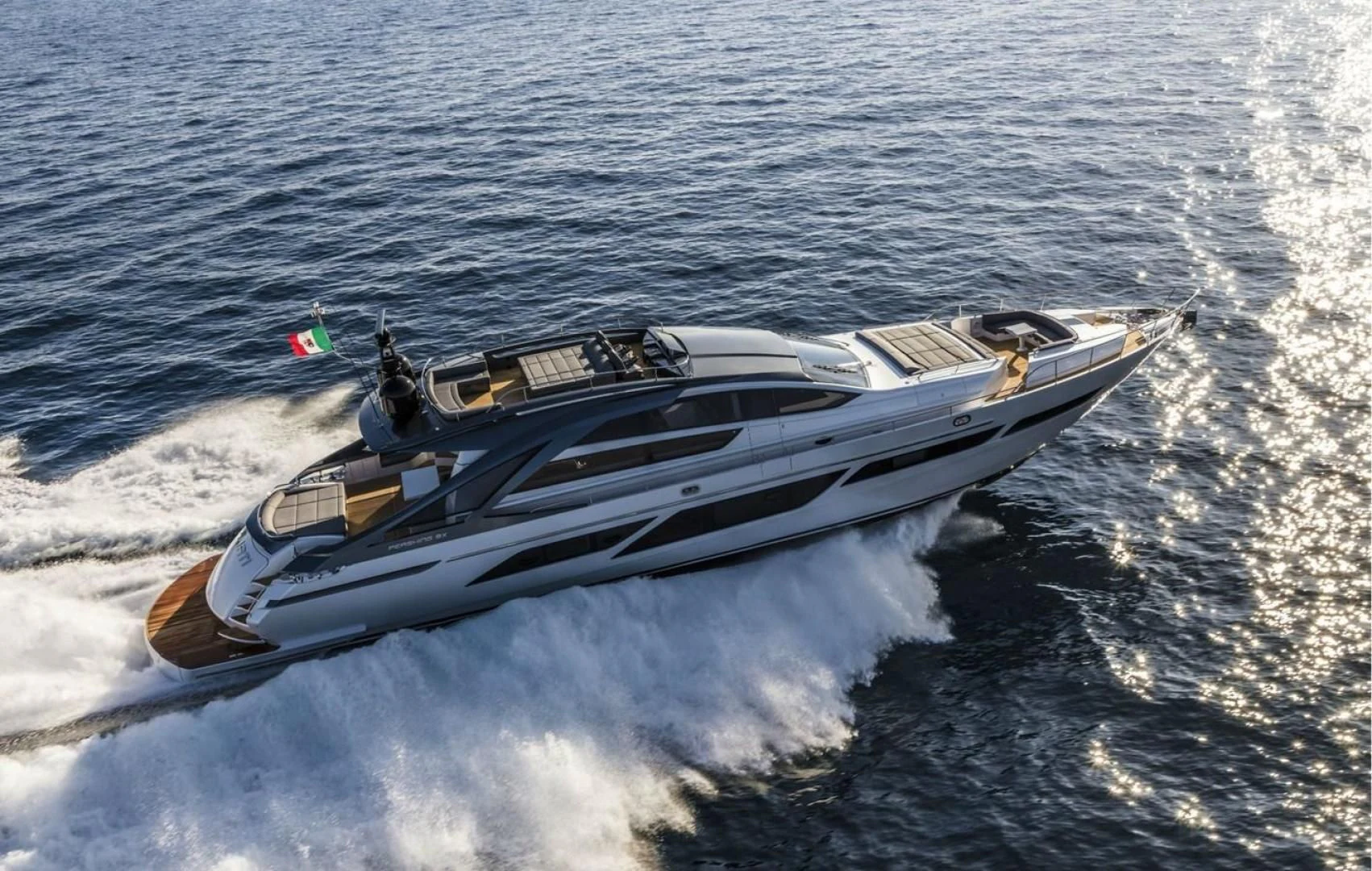a boat on the water aboard OUR TRADE Yacht for Sale
