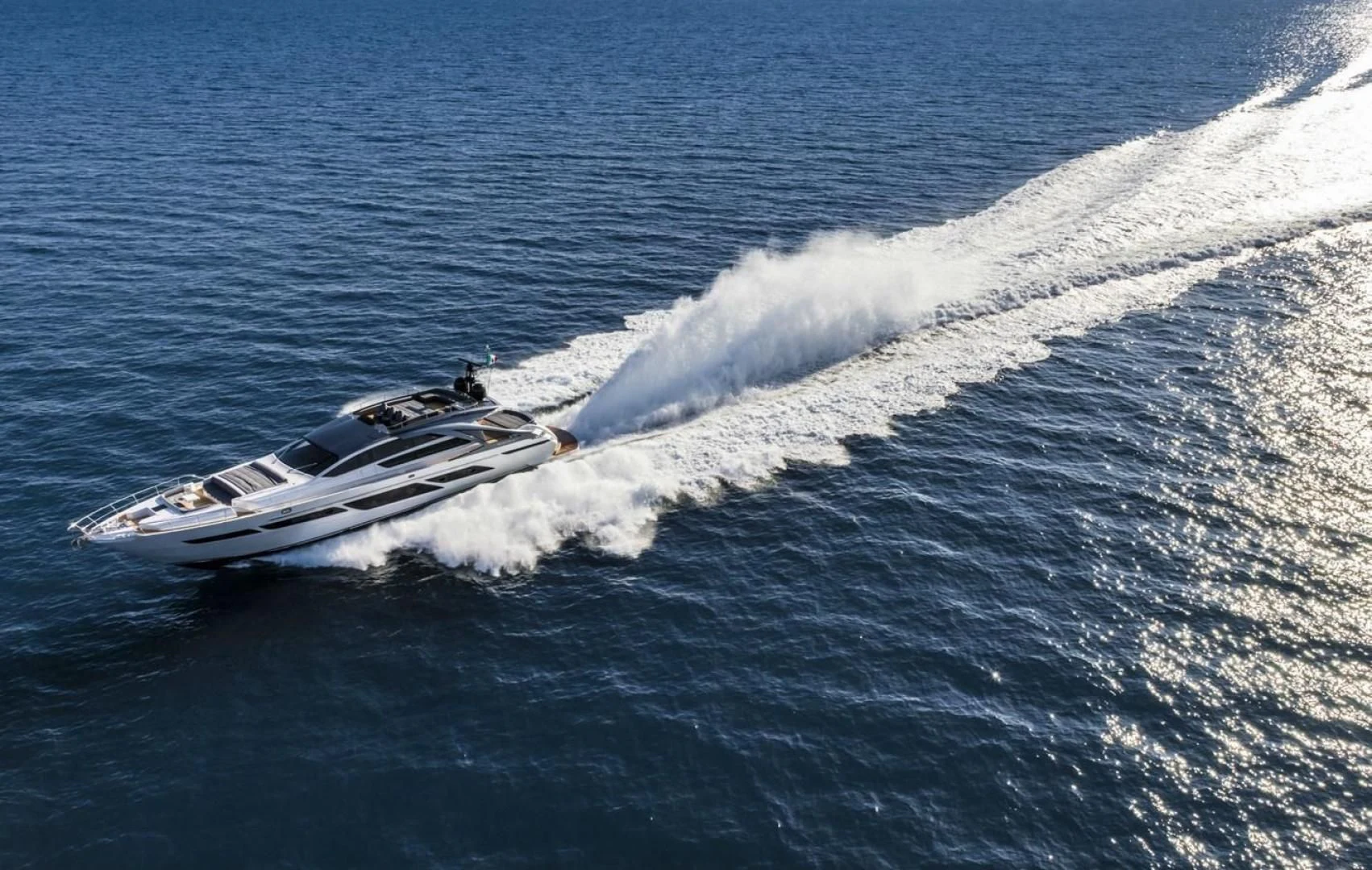 a boat on the water aboard OUR TRADE Yacht for Sale