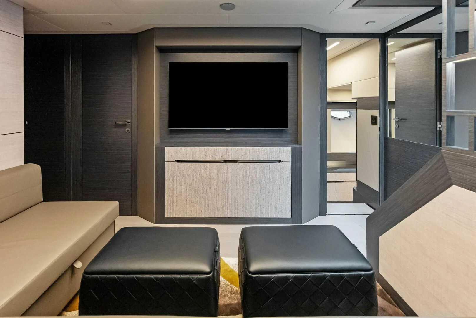 a room with a couch and a tv aboard OUR TRADE Yacht for Sale