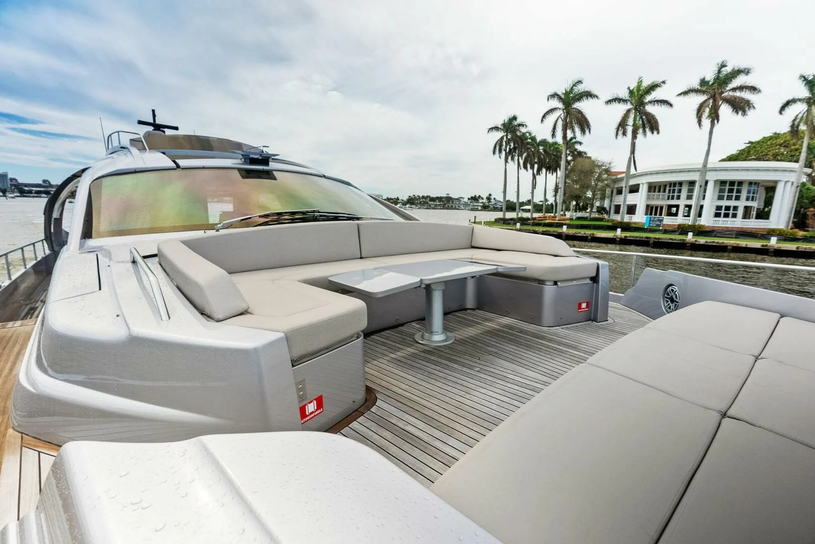 a white car on a road aboard OUR TRADE Yacht for Sale