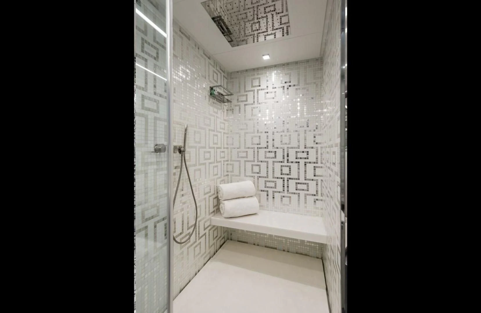 a bathroom with a shower aboard OUR TRADE Yacht for Sale