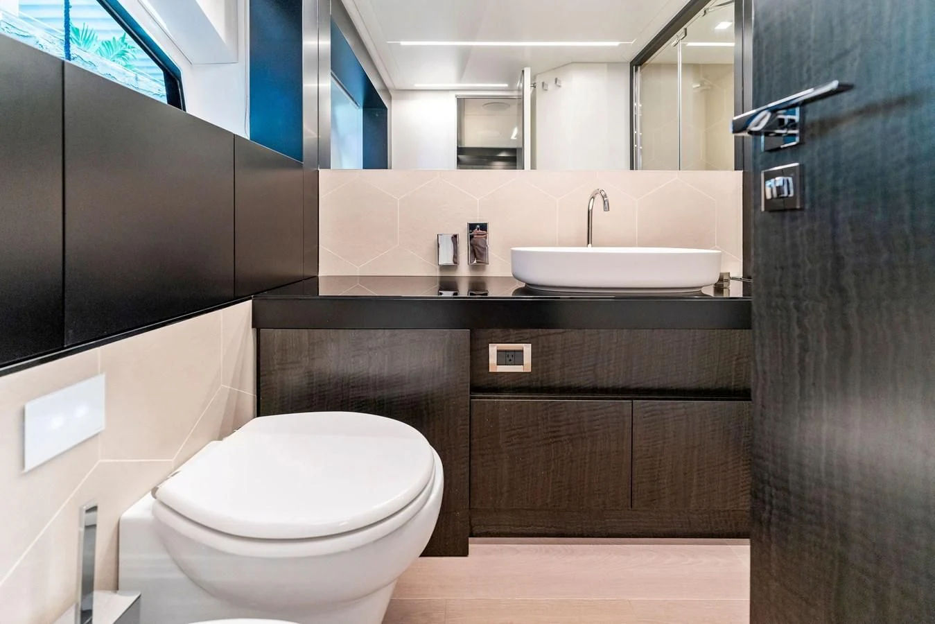 a bathroom with a sink and a toilet aboard OUR TRADE Yacht for Sale