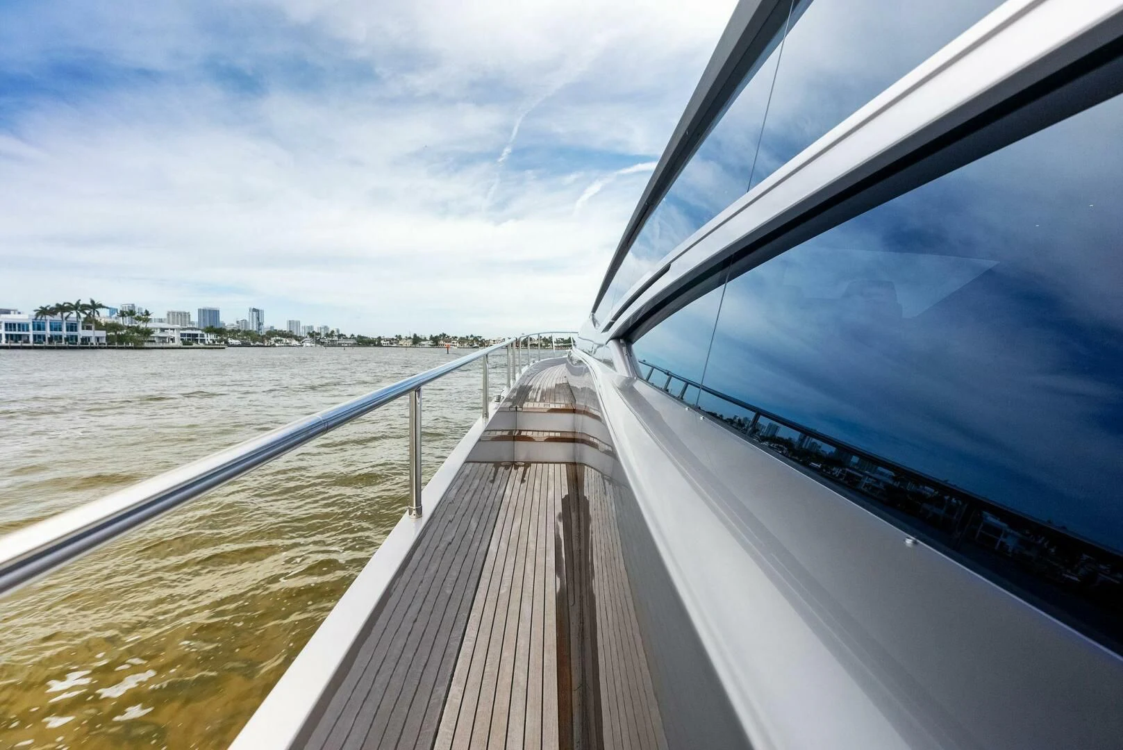 a wooden walkway over water aboard OUR TRADE Yacht for Sale