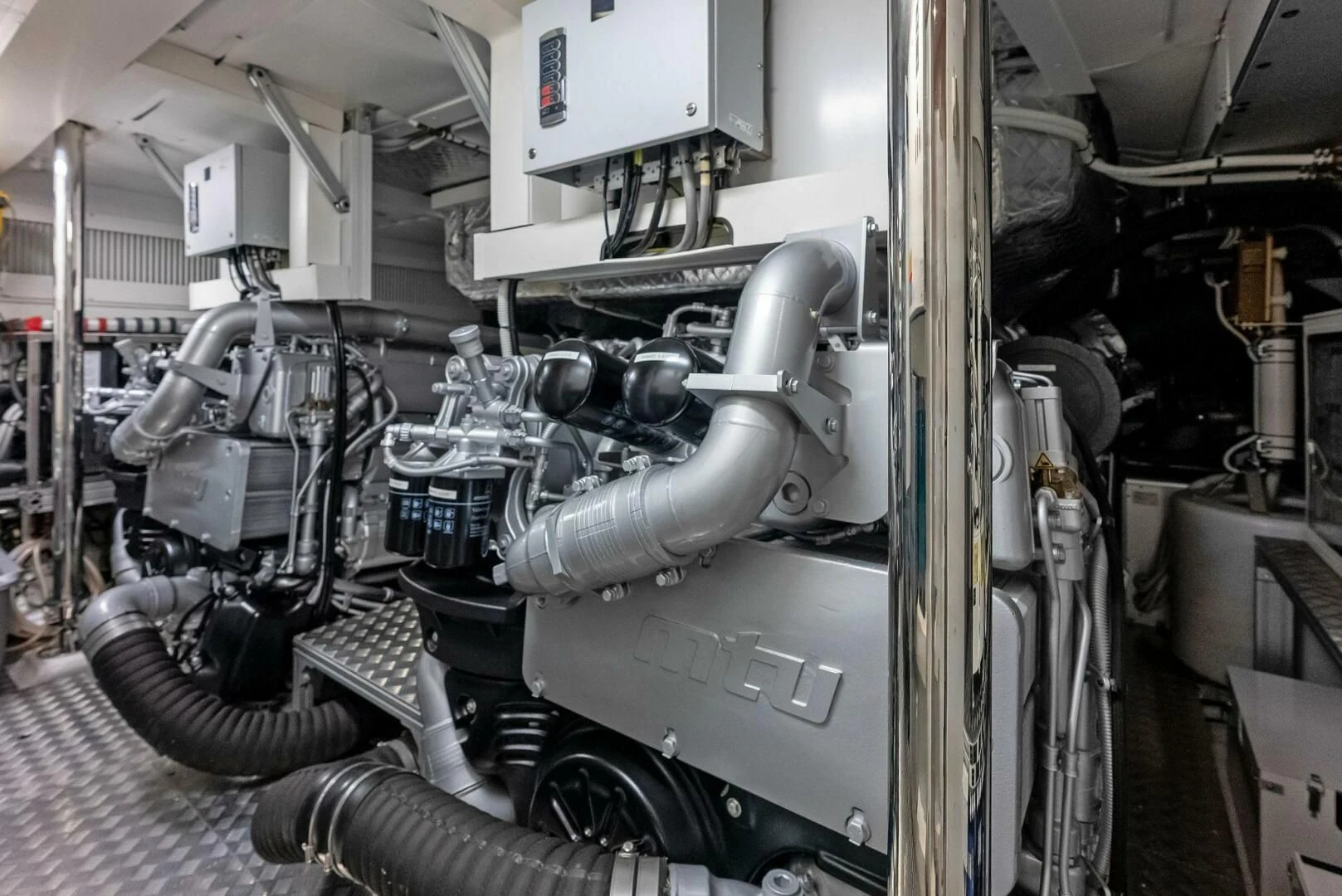 a machine with a large metal cylinder aboard OUR TRADE Yacht for Sale