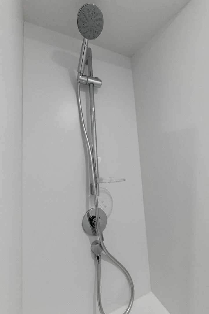 a silver shower head aboard OUR TRADE Yacht for Sale