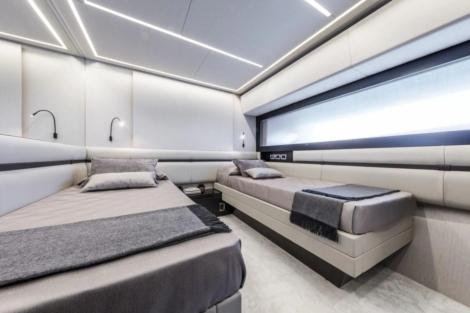 a room with a couple of beds aboard OUR TRADE Yacht for Sale