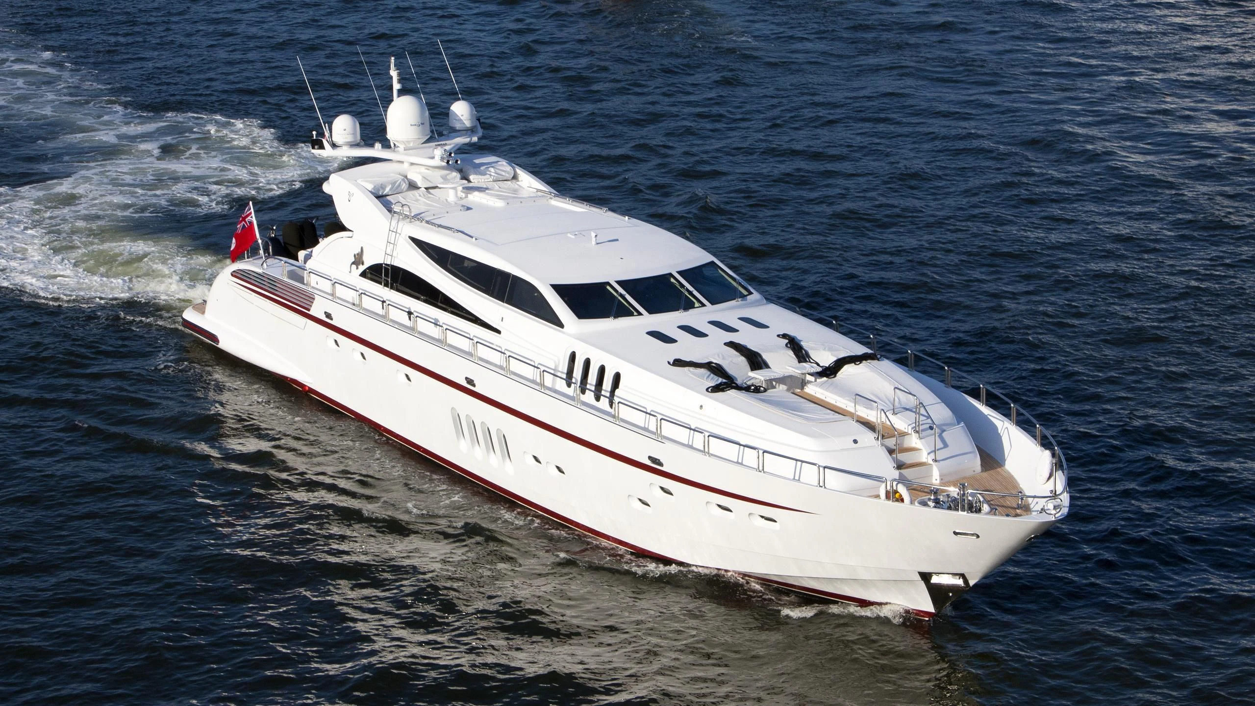 a white boat on the water aboard GO Yacht for Sale