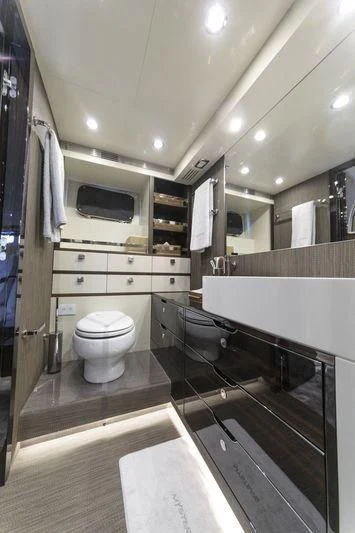a bathroom with a sink and toilet aboard MYSTERE Yacht for Sale