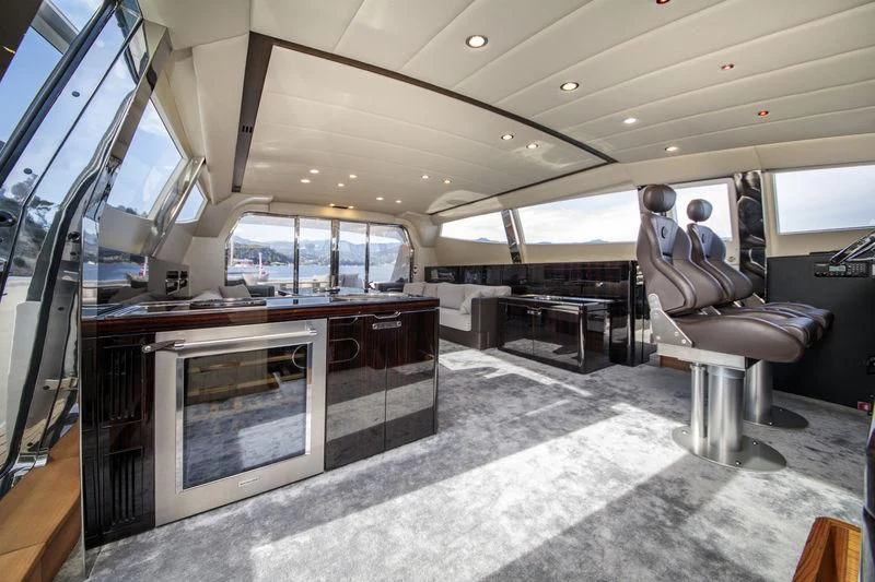 inside of a vehicle with a large window and a view of the city aboard MYSTERE Yacht for Sale