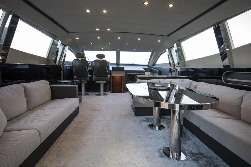 a vehicle with a table and chairs aboard MYSTERE Yacht for Sale