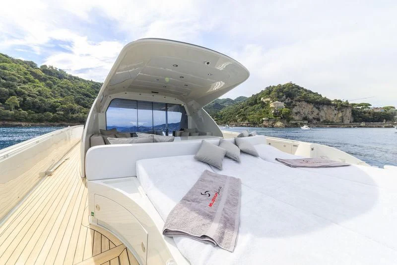a boat on a beach aboard MYSTERE Yacht for Sale