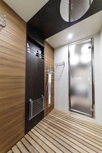 a room with a large mirror aboard MYSTERE Yacht for Sale