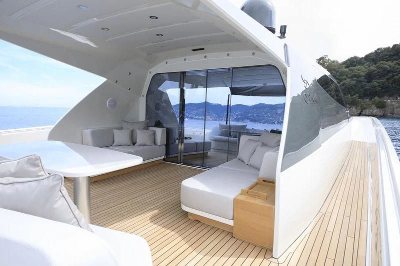 a boat with a large deck aboard MYSTERE Yacht for Sale