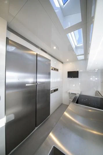 a large bathroom with a glass shower aboard MYSTERE Yacht for Sale