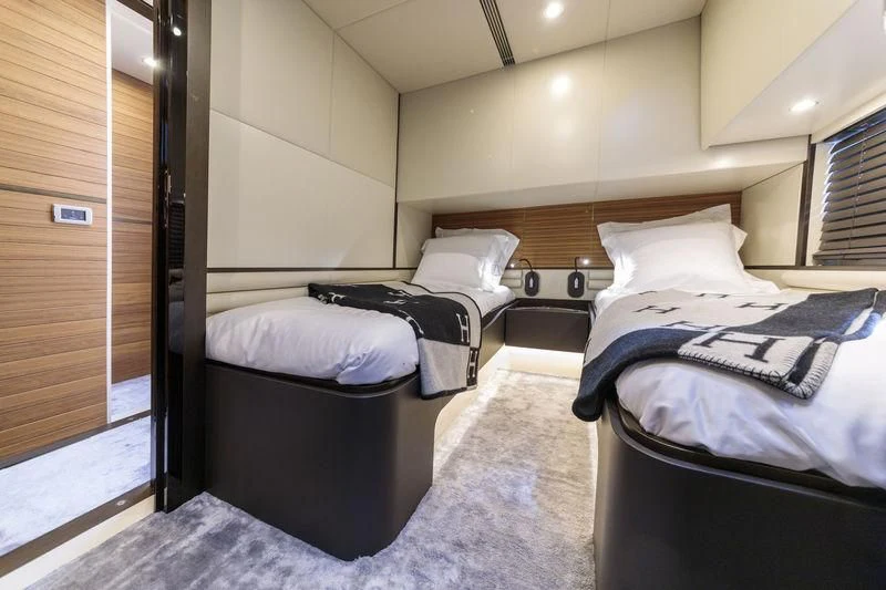 a couple of beds in a hotel room aboard MYSTERE Yacht for Sale