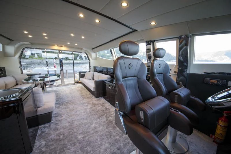 inside of a vehicle with a large window and a view of the water aboard MYSTERE Yacht for Sale