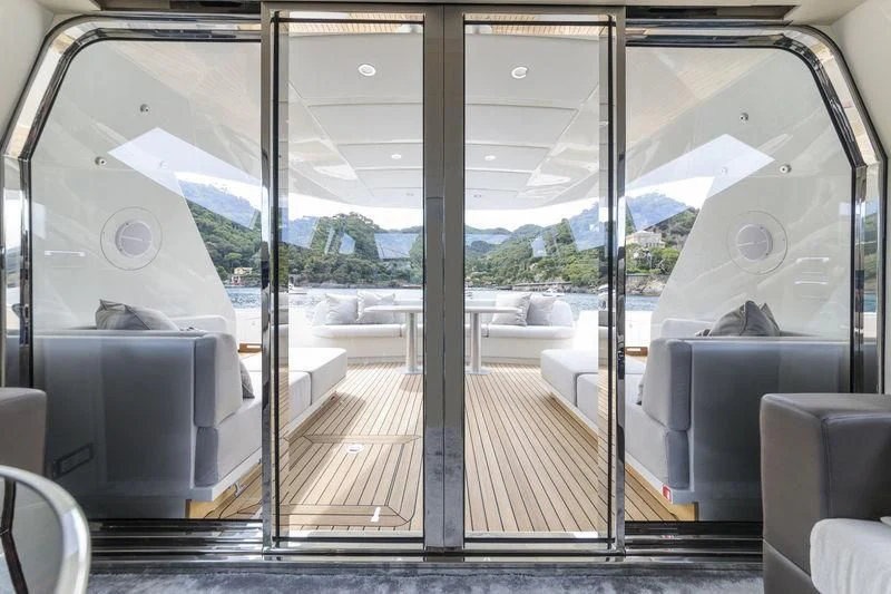 a train with a wooden deck aboard MYSTERE Yacht for Sale