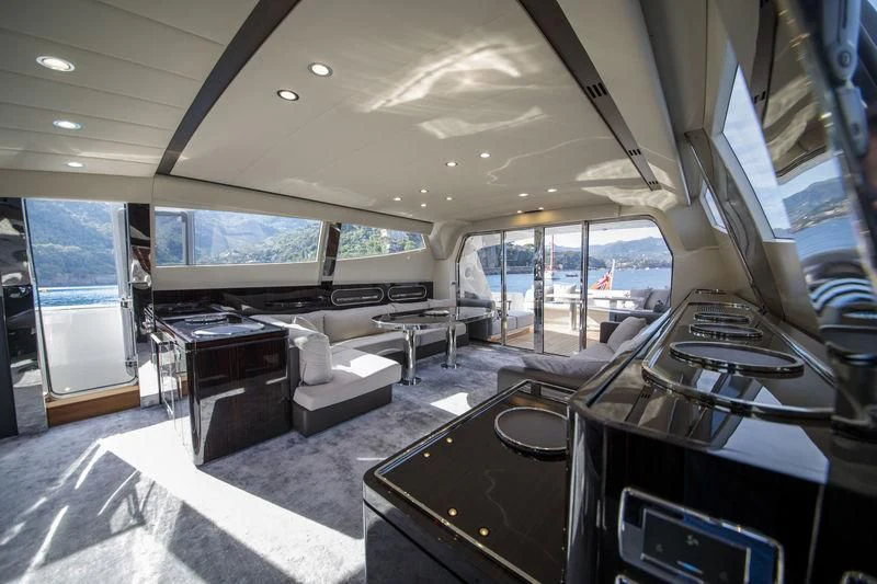inside of a vehicle with a large screen and a large window aboard MYSTERE Yacht for Sale
