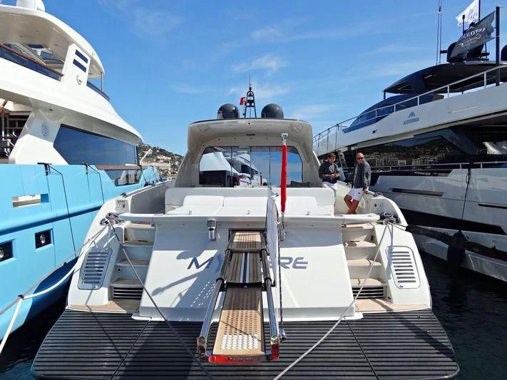 a group of people on a boat aboard MYSTERE Yacht for Sale