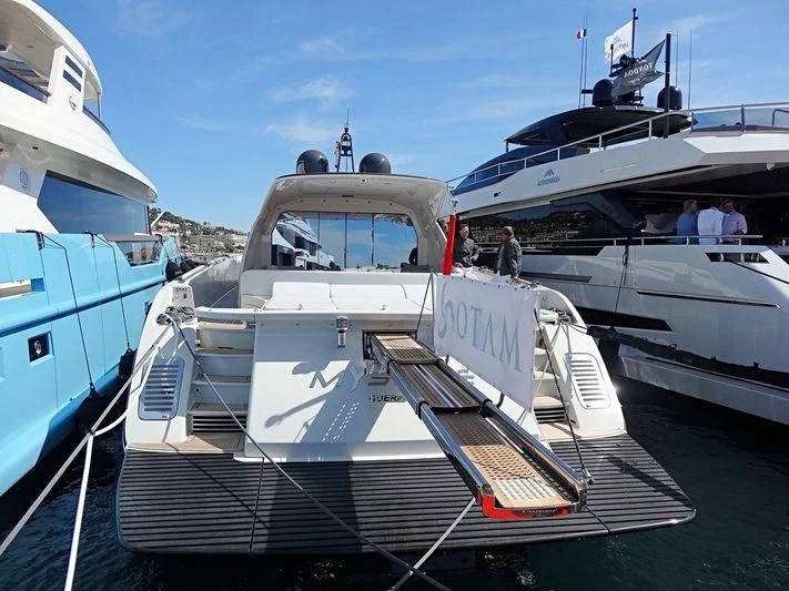 a group of people on a boat aboard MYSTERE Yacht for Sale