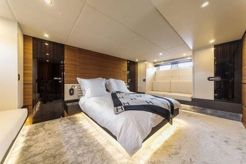 a large bed in a hotel room aboard MYSTERE Yacht for Sale