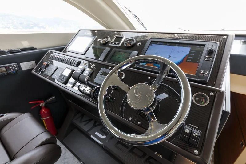 the inside of a car aboard MYSTERE Yacht for Sale