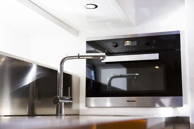 a large silver machine aboard MYSTERE Yacht for Sale