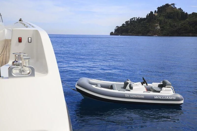 a couple of boats in the water aboard MYSTERE Yacht for Sale