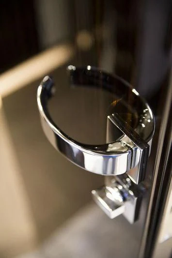 a silver faucet with a wooden handle aboard MYSTERE Yacht for Sale