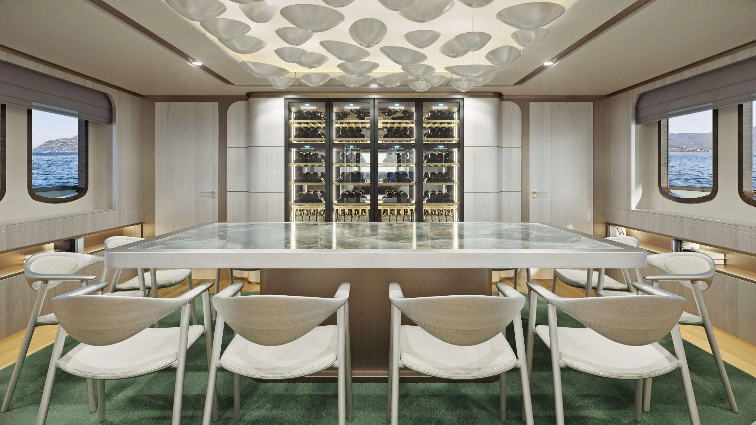 a room with tables and chairs aboard MAIA Yacht for Sale