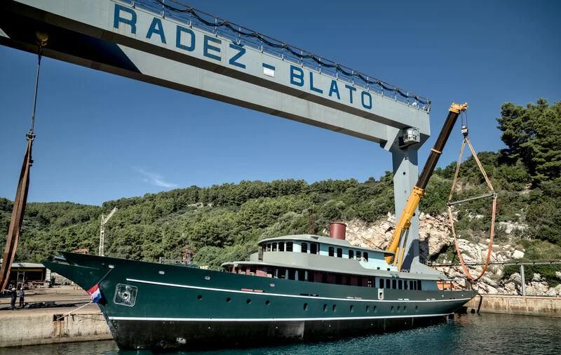 a boat with a crane on the side of it aboard MAIA Yacht for Sale