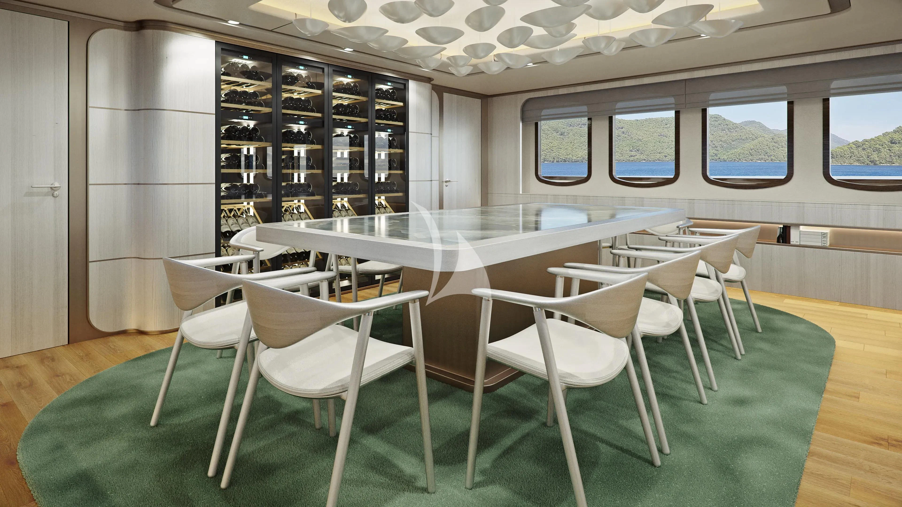 a room with tables and chairs aboard MAIA Yacht for Sale