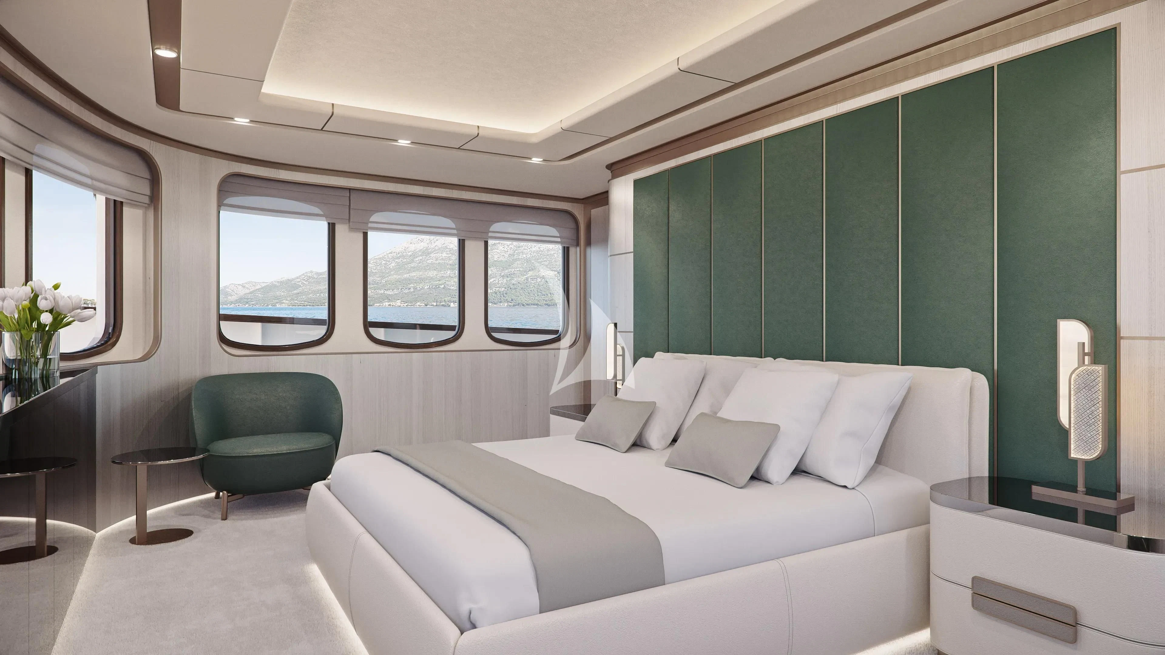a room with a bed and a chair aboard MAIA Yacht for Sale
